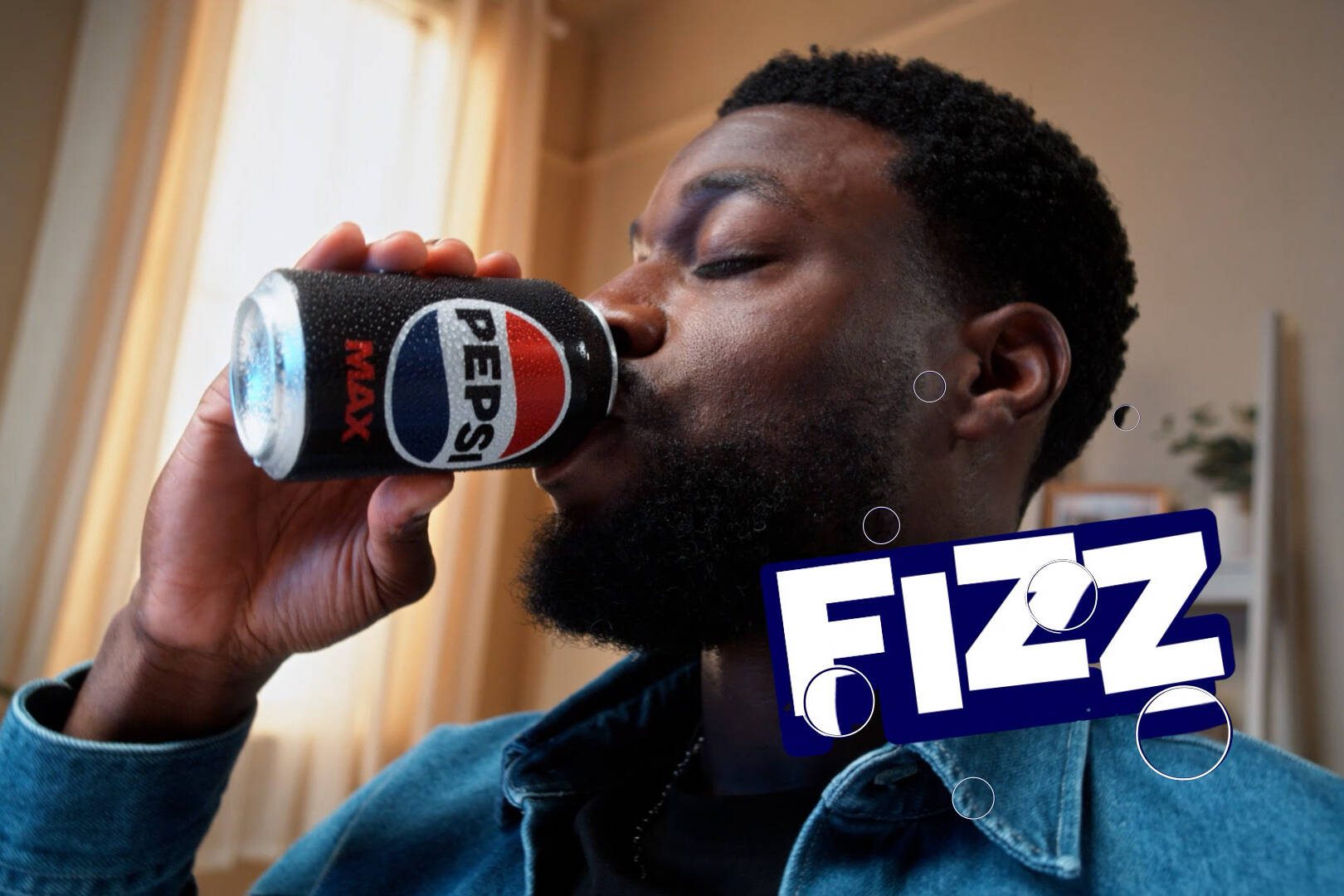 Man drinking from Pepsi can with animated ‘Fizz’ text in vibrant beverage commercial produced by our motion design studio