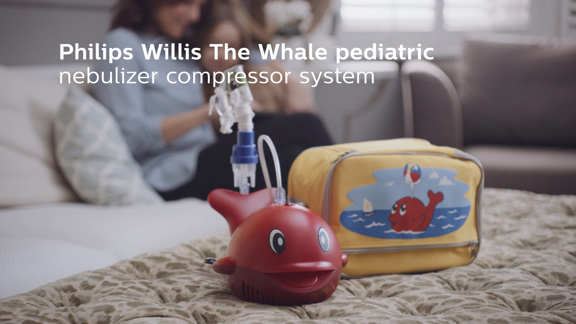 Live action image of Philips Willis the Whale pediatric nebuliser compressor system lockup for healthcare instructional film