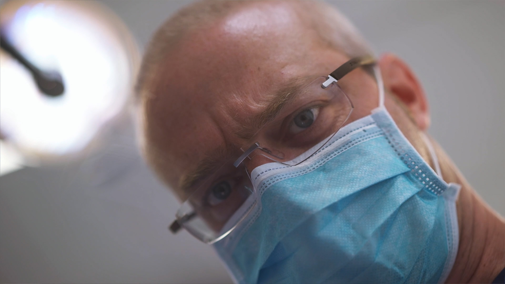 Close-up of Dr. Andrew Fennell, cosmetic and implant dentist at Winning Smiles dental practice in Essex, filmed by Sugarhill